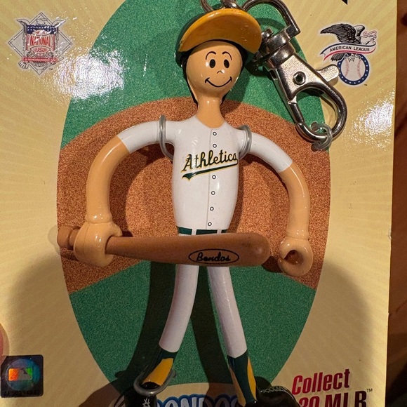 vintage Oakland Athletics "Lil' Sports Brat" bendable baseball figure keychain. - Picture 2 of 7
